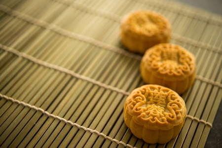 Mooncakes is traditionally baked pastry to eaten during Mid-Autumn Festival. The Chinese character on the moon cake represent "lotus paste" in English.の写真素材