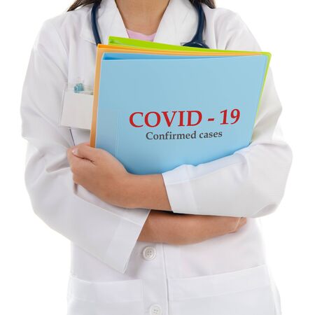 Medical doctor with Coronavirus Covid 19 report confirmed cases file.の写真素材