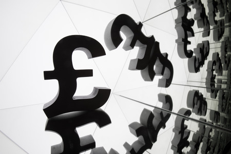 British Pound Sterling Currency Symbol With Many Mirroring Images of Itself on White Backgroundの写真素材