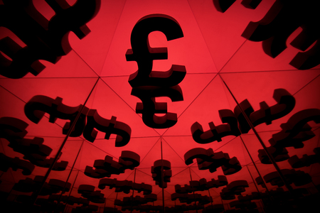 British Pound Sterling Currency Symbol With Many Mirroring Images of Itself on Red Backgroundの写真素材
