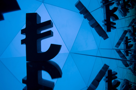 Turkish Lira Currency Symbol With Many Mirroring Images of Itself on Blue Backgroundの写真素材