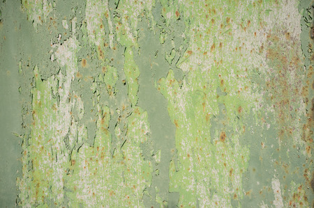 Detail of Old, Grunge, Rusty Metal Doors with Layers of Green, Turquoise and Yellow Paint and Rust.の写真素材