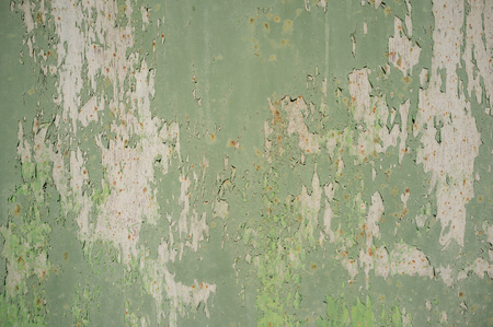 Detail of Old, Grunge, Rusty Metal Doors with Layers of Green, Turquoise and Yellow Paint and Rust.の写真素材