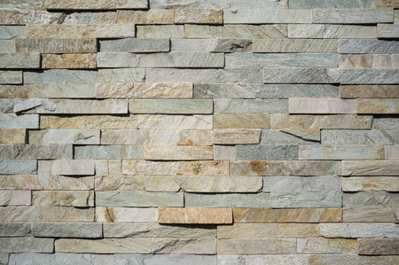 Old Weathered Tile Contractors with Look of Natural Stone Wall Textureの写真素材