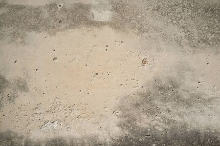 Detail of Old Weathered Wall Plaster With Holes and Scratchesの写真素材