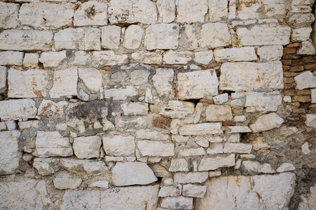 Old Grungy and Weathered Stone Wall Pattern Backgroundの写真素材