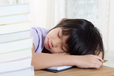 Tired school girlの写真素材
