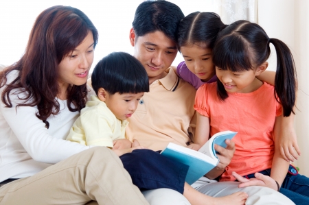 Asian family readingの写真素材