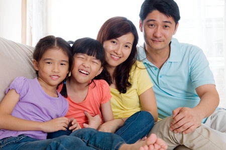 Indoor portrait of asian familyの写真素材