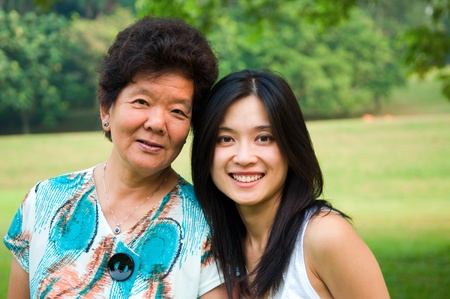 Asian senior woman and daughterの写真素材