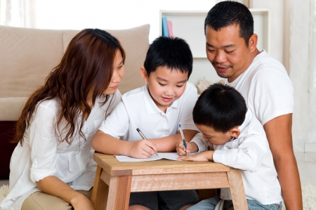 Asian kids writingの写真素材