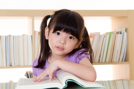 Asian girl reading