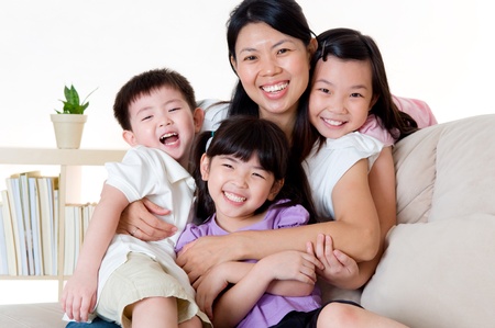 Indoor portrait of asian familyの写真素材