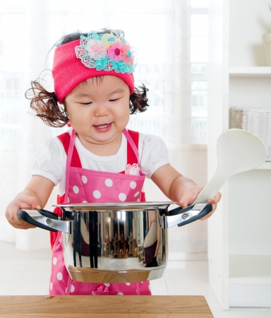 Asian girl holding a potの写真素材