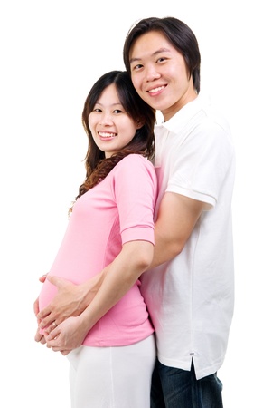 Asian pregnant woman lying on her husband chestの写真素材