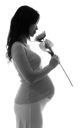 black and white shot of a pregnant womanの写真素材