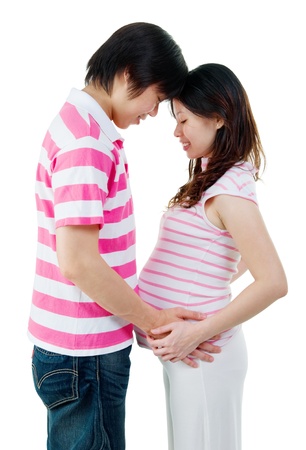 Asian man with pregnant wifeの写真素材