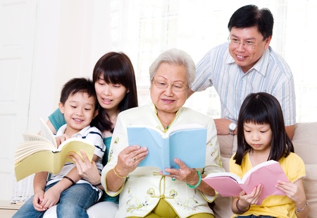 Asian family readingの写真素材