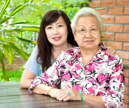 Elderly woman and her daughterの写真素材