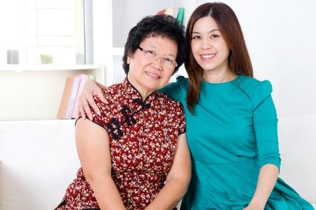 Portrait of asian senior woman and daughterの写真素材