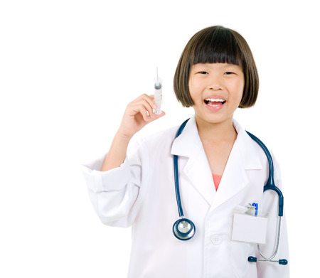 future doctor holding syringe isolated on white backgroundの写真素材