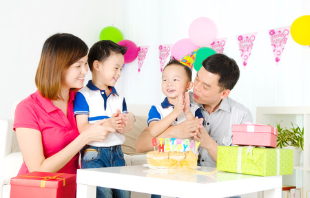 Asian family celebrating birthdayの写真素材