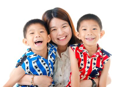 Asian mother and her twin sonsの写真素材