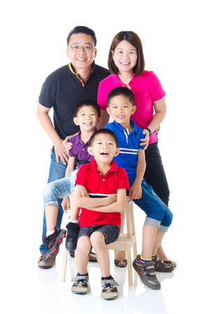 Indoor portrait of asian familyの写真素材