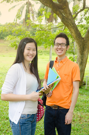 Cheerful asian college studentsの写真素材