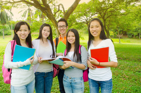 Group of cheerful asian college studentsの写真素材