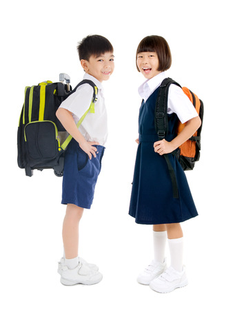 Asian school kids in uniform and carried schoolbagの写真素材