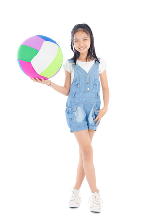 Asian girl holding a ballの写真素材
