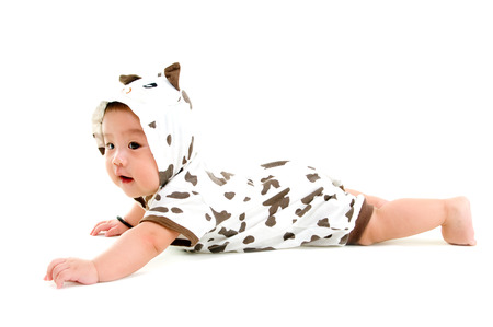 Indoor portrait of asian baby crawl on the floorの写真素材