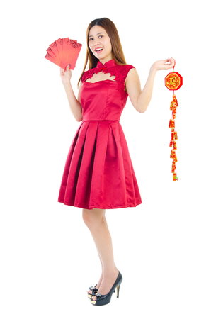 Beautiful asian woman holding red packet and firecracker decoration. Chinese new year concept.の写真素材