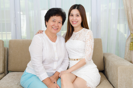 Asian senior woman and daughterの写真素材