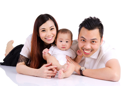 Portrait of asian parent and their six months old baby boyの写真素材