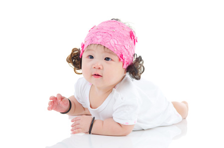 Indoor portrait of beautiful asian baby girlの写真素材