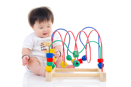 Lovely asian girl playing with toyの写真素材