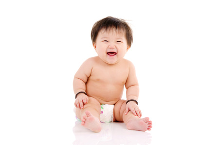 Indoor portrait of beautiful asian baby girlの写真素材