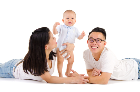 Asian parent playing with their baby boyの写真素材