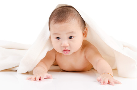 Indoor portrait of lovely asian babyの写真素材