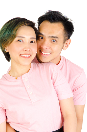 Indoor porttrait of beautiful asian coupleの写真素材