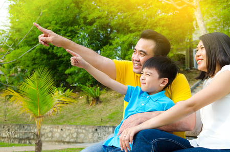 Outdoor portrait of asian familyの写真素材