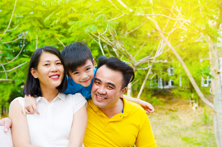 Outdoor portrait of asian familyの写真素材