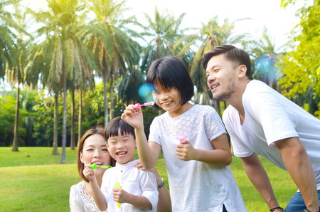 Lovely asian family enjoyed bonding time togetherの写真素材