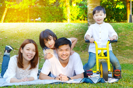 Asian family enjoyed outdoor nature at the parkの写真素材