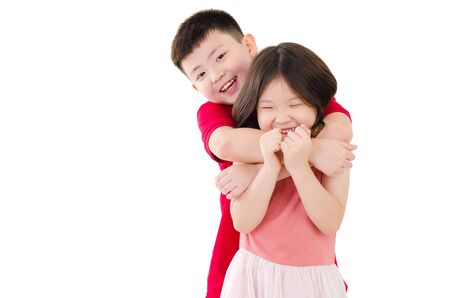 Lovely asian boy hug his sisterの写真素材