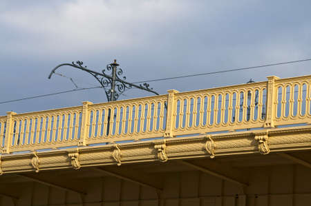 Yellow bridge detail with blue sky