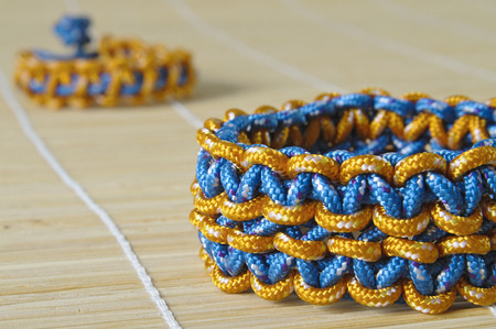 Two color knotted paracord bracelet macro detail