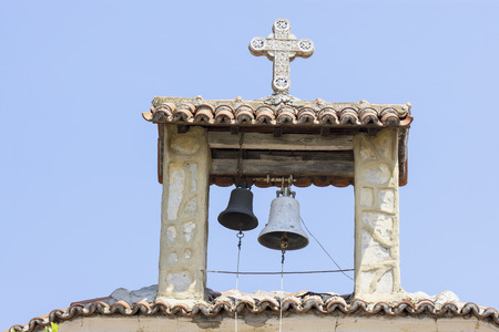Small bells on the top of church with clear blue skyの写真素材